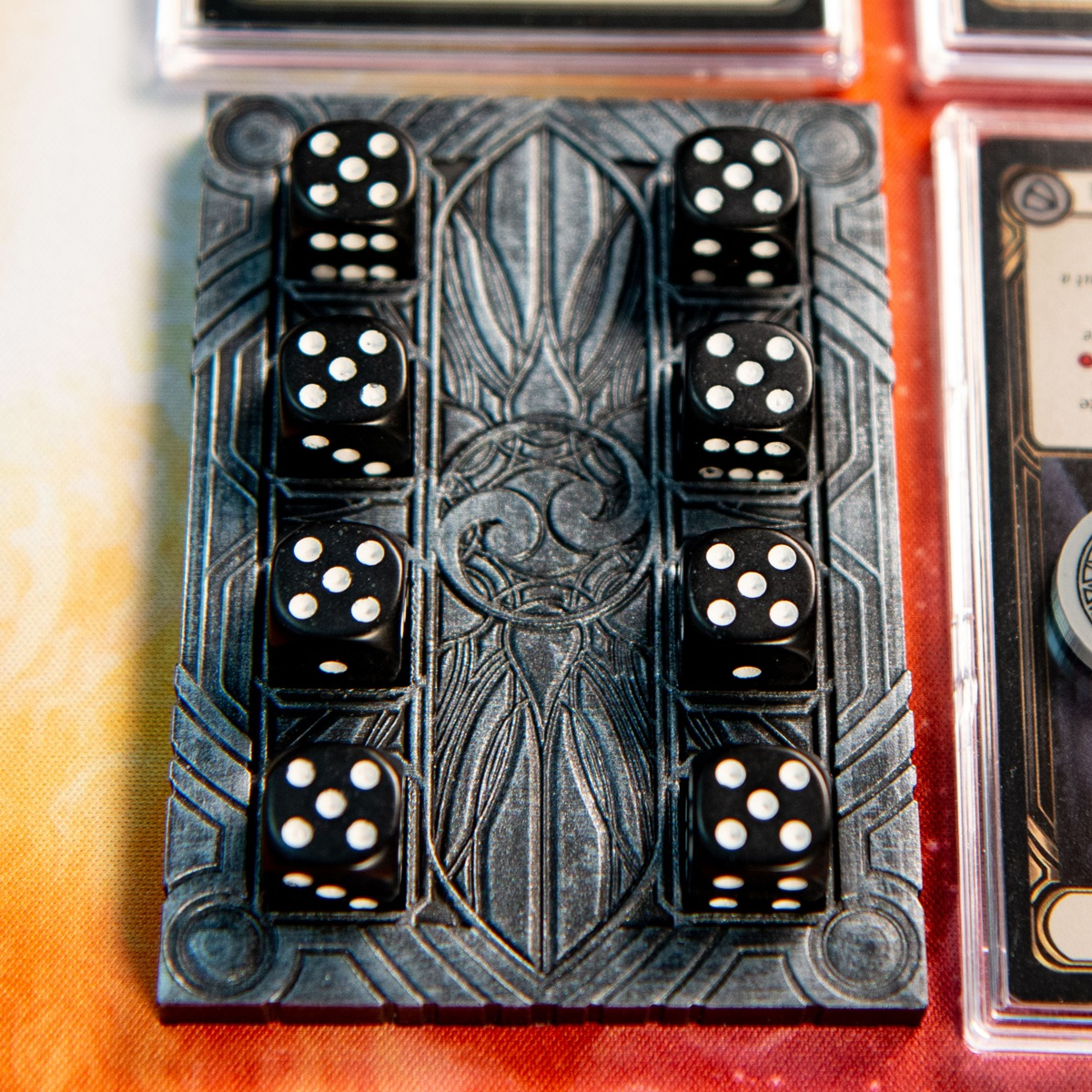Majestic Dice Board - Battleworn Edition brightly lit and full of dice, Flesh and Blood TCG cards are just out of frame