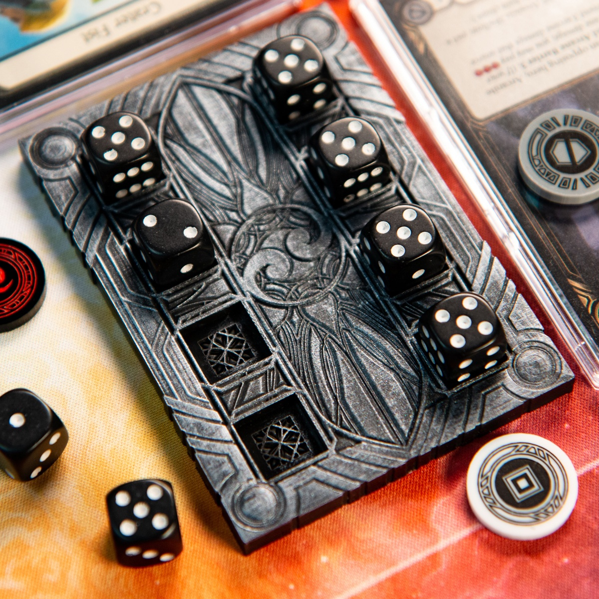 Majestic Dice Board - Battleworn Edition mostly full of dice, surrounded by tokens from the Majestic Token Set as well as cards from Flesh and Blood TCG