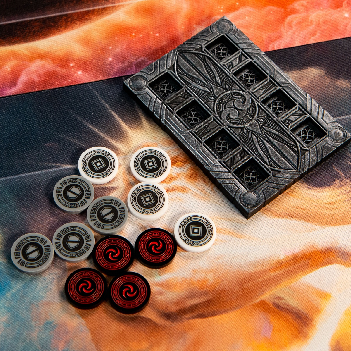 Armor Tokens, Activation Tokens, and Resource Tokens scattered to the left of a Majestic Dice Board and on top of a Flesh and Blood TCG Playmat