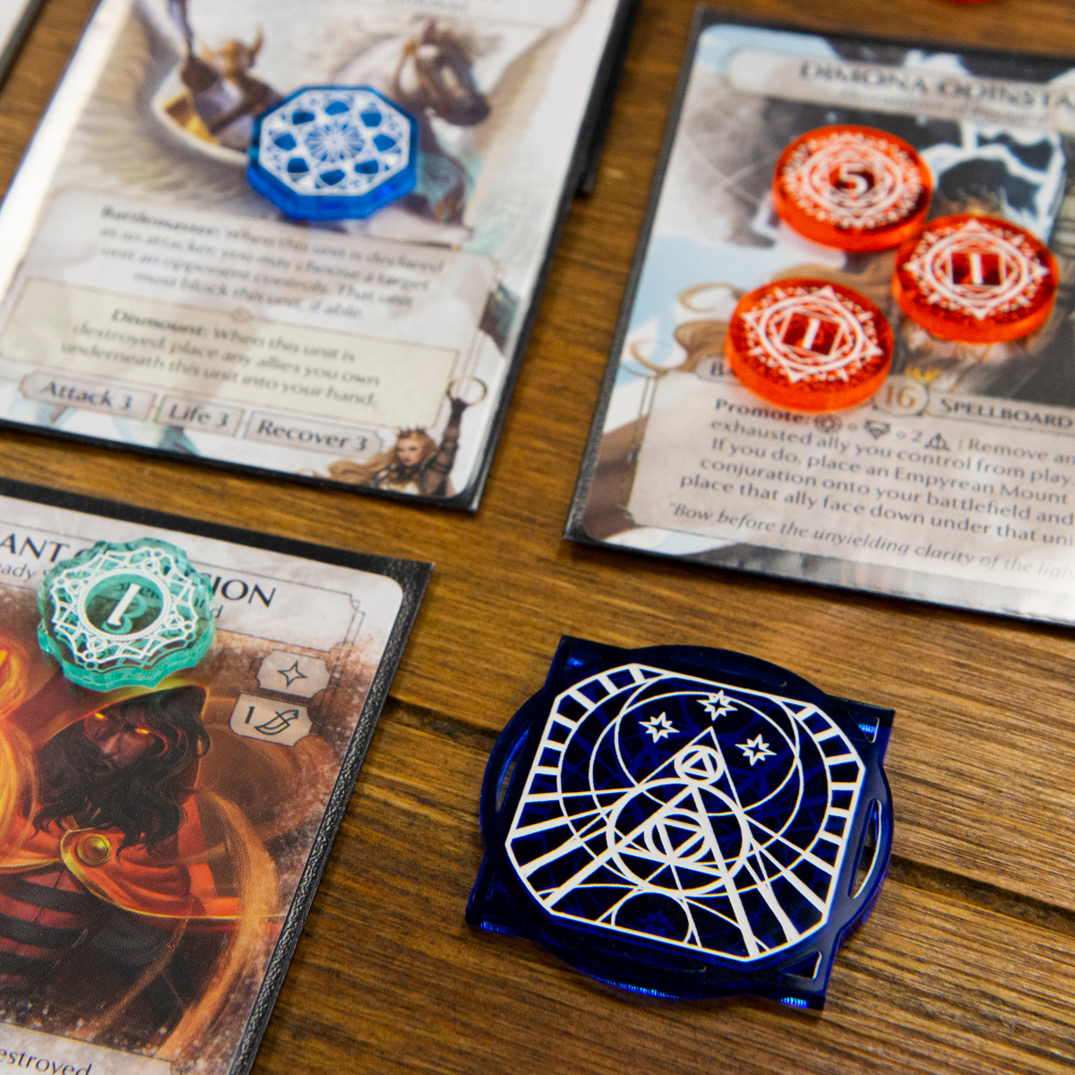 Arcane Token Set on a table, set up as it might look in a game of Ashes: Reborn