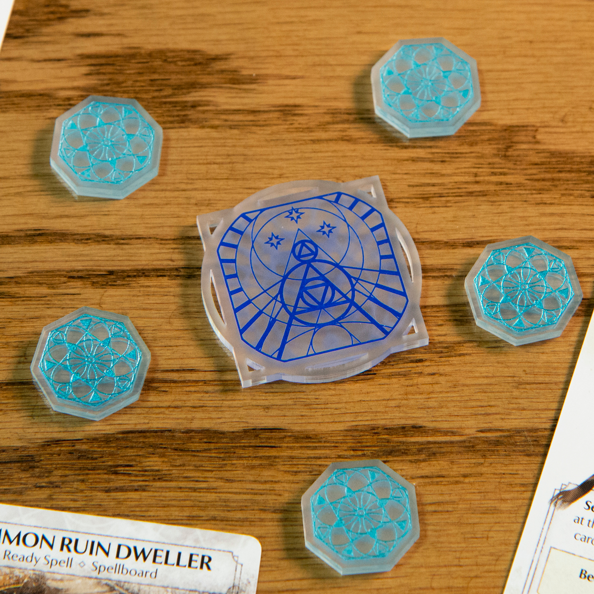 Frostdale Supplement Set laid out on a wooden table