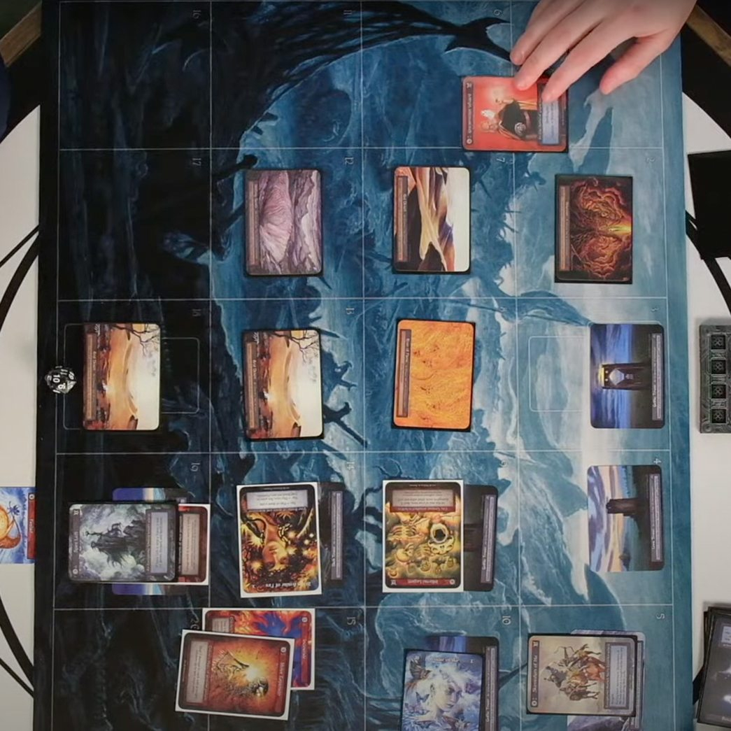 Still from our video using the Sorcery Battlefield playmat