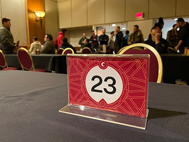 A table number card 23 at a tournament run by Covenant.